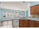 An open concept living room shows tile floors and arched doorways, plus bright paint and natural light at 6244 Catalina Dr. # 511, North Myrtle Beach, SC 29582