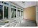 This sunroom offers many windows and natural light with access to the backyard at 6244 Catalina Dr. # 511, North Myrtle Beach, SC 29582