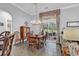 Cozy dining area with tile flooring offering easy access to the outdoor patio at 67 Camden Circle, Pawleys Island, SC 29585