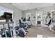 Fitness center features modern exercise equipment, natural light, and comfortable workout space at 67 Camden Circle, Pawleys Island, SC 29585