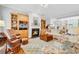 Inviting living area with fireplace, built-ins, comfortable seating and hardwood floors at 67 Camden Circle, Pawleys Island, SC 29585