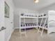 Bedroom with bunk beds with carpeting and a modern interior design at 7202 Seville Dr., Myrtle Beach, SC 29572