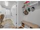 Mud room with bench, shelves, and view to laundry area at 7202 Seville Dr., Myrtle Beach, SC 29572