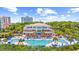 Resort-style community pool with ample seating, lush landscaping, and ocean views at 7202 Seville Dr., Myrtle Beach, SC 29572