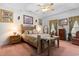 Cozy bedroom with a wooden bed frame, bedside tables, and tasteful decor at 728 Churchill Dr., Myrtle Beach, SC 29579