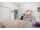 Bedroom boasts ample closet space, a dresser with a mirror, and neutral decor at 728 Churchill Dr., Myrtle Beach, SC 29579