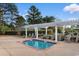 Relaxing community spa area with a pergola and lounge chairs, perfect for unwinding at 728 Churchill Dr., Myrtle Beach, SC 29579