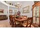 Formal dining room with a chandelier, decorative wall art and seating for six at 728 Churchill Dr., Myrtle Beach, SC 29579