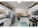 Bright kitchen with stainless steel appliances and eat-in dining area at 728 Churchill Dr., Myrtle Beach, SC 29579