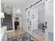 Stylish foyer with a view into the living room through a modern sliding barn door at 815 Murray Ave., Myrtle Beach, SC 29577