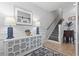 Inviting foyer with decorative furniture, rug, and stairway leading to the upper level at 815 Murray Ave., Myrtle Beach, SC 29577
