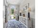 Bright entryway with a sliding barn door, decor, and a view to the outdoors through the front door at 815 Murray Ave., Myrtle Beach, SC 29577