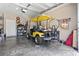 Spacious garage with a golf cart, storage shelves, and garage door opener at 815 Murray Ave., Myrtle Beach, SC 29577