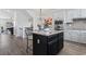 Open concept kitchen with island, stainless steel appliances, and granite countertops at 815 Murray Ave., Myrtle Beach, SC 29577