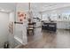 Bright kitchen features white cabinets, granite countertops, stainless steel appliances, and a breakfast bar at 815 Murray Ave., Myrtle Beach, SC 29577