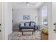 Comfortable living room with a sofa, decorative rug, and natural light from the window at 815 Murray Ave., Myrtle Beach, SC 29577