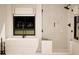 Luxurious bathroom featuring a freestanding tub, glass-enclosed shower, and modern fixtures at 9 Sw Mashie Ct., Carolina Shores, NC 28467