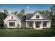 Charming craftsman-style home with white siding, a covered porch, and professionally landscaped front yard at 9 Sw Mashie Ct., Carolina Shores, NC 28467
