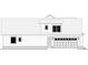 Side elevation showing the two-car garage and siding details of the home at 9 Sw Mashie Ct., Carolina Shores, NC 28467