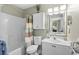 Well-lit bathroom with a tub and shower combination, a white vanity, and a decorative shower curtain at 9679 Stillwater Ct., Myrtle Beach, SC 29572