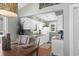 Cozy dining area next to the bright kitchen with white cabinetry and a convenient pass-through at 9679 Stillwater Ct., Myrtle Beach, SC 29572
