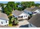 Exterior view of beach home with a cozy porch and lush landscaping at 9679 Stillwater Ct., Myrtle Beach, SC 29572
