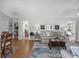 Comfortable living room with cozy seating, stylish decor, and seamless flow to the dining area at 9679 Stillwater Ct., Myrtle Beach, SC 29572