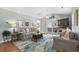 Cozy living room featuring a fireplace, comfortable seating, and sliding glass doors at 9679 Stillwater Ct., Myrtle Beach, SC 29572