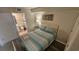 Inviting bedroom featuring a comfortable bed and an adjacent bathroom at 102 N Ocean Blvd. # 405, North Myrtle Beach, SC 29582