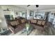 Cozy living room with comfortable seating and mirrored wall at 102 N Ocean Blvd. # 405, North Myrtle Beach, SC 29582