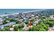 Aerial perspective showing proximity to the beach in a neighborhood full of colorful homes at 108 N Oak Dr., Surfside Beach, SC 29575