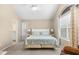 Spacious bedroom with a queen size bed and window view at 108 N Oak Dr., Surfside Beach, SC 29575
