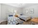 Charming bedroom featuring two twin beds with nautical themed decor at 108 N Oak Dr., Surfside Beach, SC 29575