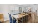 Cozy dining space featuring a large table, views to the kitchen, and beach-themed decor at 108 N Oak Dr., Surfside Beach, SC 29575
