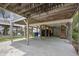 View under elevated house showing support beams and concrete slab at 108 N Oak Dr., Surfside Beach, SC 29575