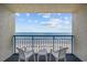 Breathtaking view from the balcony with outdoor seating overlooking the beach and ocean at 1105 S Ocean Blvd. # 928, Myrtle Beach, SC 29577