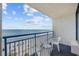 Enjoy breathtaking ocean views from this private balcony with comfortable seating and blue metal railing at 1105 S Ocean Blvd. # 928, Myrtle Beach, SC 29577