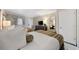Comfortable bedroom featuring two beds with patterned throws, TV on dresser, large mirror and neutral decor at 1105 S Ocean Blvd. # 928, Myrtle Beach, SC 29577