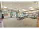 Large meeting room featuring a table and many chairs; also has an area for mailboxes and packages at 1105 S Ocean Blvd. # 928, Myrtle Beach, SC 29577