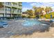 Inviting outdoor pool area featuring a connected hot tub, and poolside lounge seating at 1105 S Ocean Blvd. # 928, Myrtle Beach, SC 29577