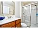 Bathroom featuring a vanity, large mirror, and walk-in shower at 1141 Prescott Circle, Myrtle Beach, SC 29577