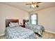 This bedroom has a ceiling fan, carpet, and natural light at 1141 Prescott Circle, Myrtle Beach, SC 29577