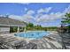 Enjoy this stunning community pool featuring lounge chairs, a covered picnic area, and ample seating under a blue sky at 1141 Prescott Circle, Myrtle Beach, SC 29577