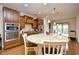 Gourmet kitchen features stainless steel appliances, granite countertops, and custom wood cabinetry at 1141 Prescott Circle, Myrtle Beach, SC 29577