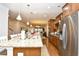 Open kitchen featuring granite counters, stainless steel appliances, and seamless flow to the living area at 1141 Prescott Circle, Myrtle Beach, SC 29577