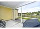 Relaxing screened-in patio provides a peaceful outdoor seating area and space for a grill at 1141 Prescott Circle, Myrtle Beach, SC 29577