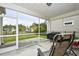Relaxing screened-in patio provides a peaceful outdoor seating area at 1141 Prescott Circle, Myrtle Beach, SC 29577