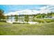 Scenic pond with fountain, surrounded by lush green landscaping at 1141 Prescott Circle, Myrtle Beach, SC 29577