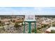 Aerial view of the Conway water tower, nestled amidst lush greenery and town buildings at 1404 Riverport Dr., Conway, SC 29526