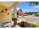 View from the front porch showcasing the neighborhood and the American flag at 1404 Riverport Dr., Conway, SC 29526